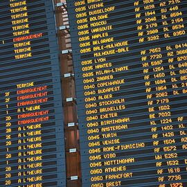 Arrival board at Paris Charles de Gaulle International Airport by Sami Sarkis Photography