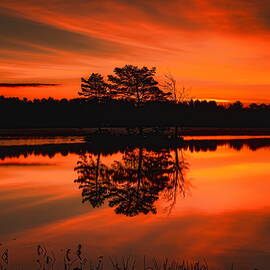 Autumn Sunrise Over Boom Lake by Dale Kauzlaric