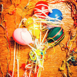 Balloons entangled with colorful streamers by Jorgo Photography