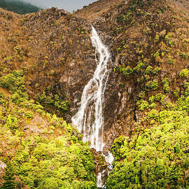 Beautiful waterfall in sunlight by Jorgo Photography