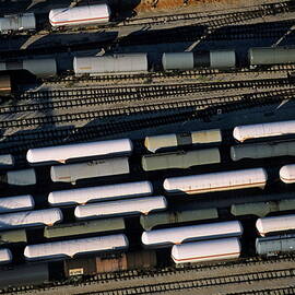 Carriages of freight trains on a commercial railway by Sami Sarkis Photography