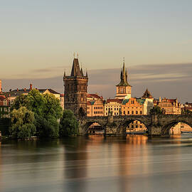 Charles bridge in Prague at sunset by Miroslav Liska