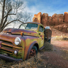 Deserted Dodge pickup vehicle parked near Twin Rocks in Utah by Miroslav Liska