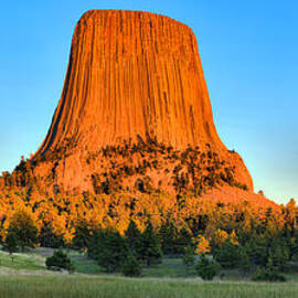 Devils Tower Golden Glow by Adam Jewell