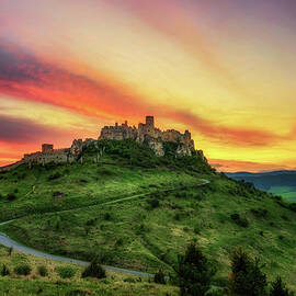 Dramatic sunset over the ruins of Spis Castle in Slovakia by Miroslav Liska