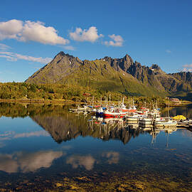 Fishing boats and yachts on Lofoten islands in Norway by Miroslav Liska