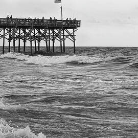 Fishing off the pier at Myrtle Beach by Flees Photos