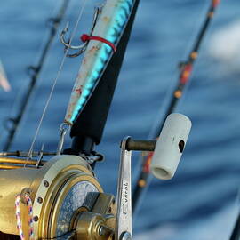 Fishing rods onboard a boat in the Mediterranean Sea by Sami Sarkis Photography