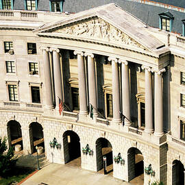Flags flying outside Capitol Building in Washington DC by Sami Sarkis Photography