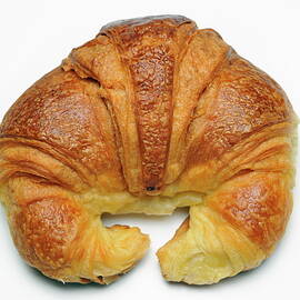 French Croissant on white background by Sami Sarkis Photography