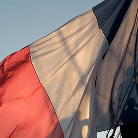 French flag flying on the mast of belem by Sami Sarkis Photography