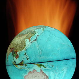 Globe with flames by Sami Sarkis Photography