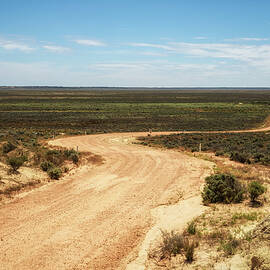 Gravel road through the Mungo National Park, Australia by Miroslav Liska