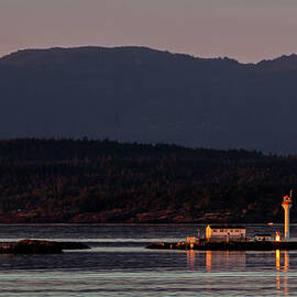 Isolated Lighthouse by Ed Clark