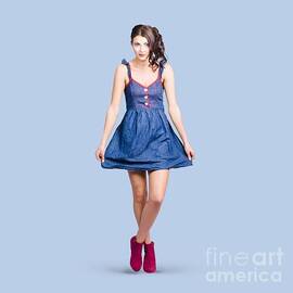 Lovable eighties female pin-up in denim dress by Jorgo Photography