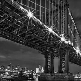 Manhattan Bridge Frames The Brooklyn Bridge by Susan Candelario
