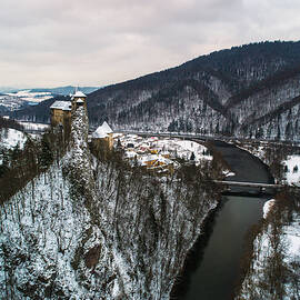Medieval castle in winter by Miroslav Liska