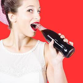 Old-fashion pop art girl drinking from soda bottle by Jorgo Photography