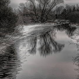 Plover River Black and White Winter Reflections by Dale Kauzlaric