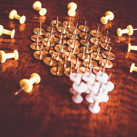Pushpins and thumbtacks arranged as light bulb by Jorgo Photography