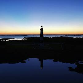 Reflection of Bodie Light at Sunset by M C Hood