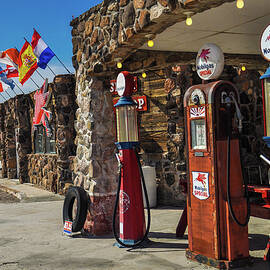 Restored antique gas pumps by Miroslav Liska