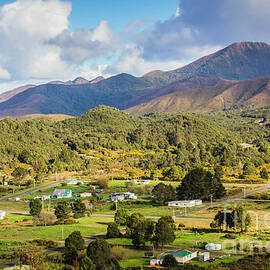 Rural landscape with mountains and valley village by Jorgo Photography