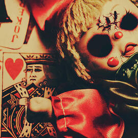 Scary Doll Dressed As Joker On Playing Card by Jorgo Photography