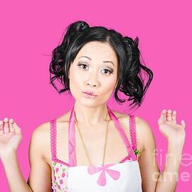 Cute Asian pinup woman with surprised expression by Jorgo Photography