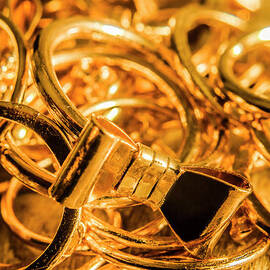 Shiny gold rings by Jorgo Photography