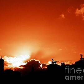 Silhouette of Rome against a sunset sky by Stefano Senise