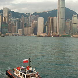 Skyline across the harbor from Kowloon in the morning by Sami Sarkis Photography