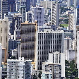 Skyscrapers nearby Waikiki beach by Sami Sarkis Photography