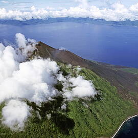Smoking volcano of Lopevi Island in Vanuatu by Sami Sarkis Photography