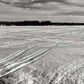 Snowmobile Tracks on China Lake by Olivier Le Queinec