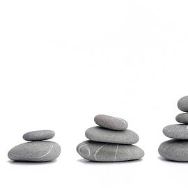 Stacks of pebbles by Sami Sarkis Photography