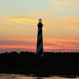 Sunset over Cape Hatteras Light by M C Hood