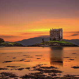 Sunset over Castle Stalker,  Scotland, United Kingdom by Miroslav Liska