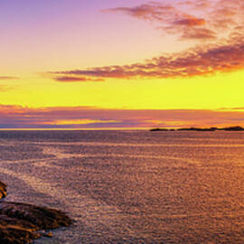 Sunset over the lighthouse in Henningsvaer on Lofoten islands by Miroslav Liska