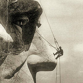 The construction of The Mount Rushmore National Memorial, detail of Abraham Lincoln,1928  by American School