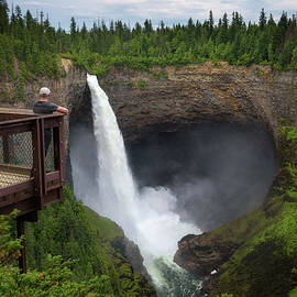 Tourist at Helmcken Falls in Wells Gray Provincial Park in Canada by Miroslav Liska