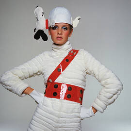 Twiggy Wearing Snoopy Hat by Bert Stern
