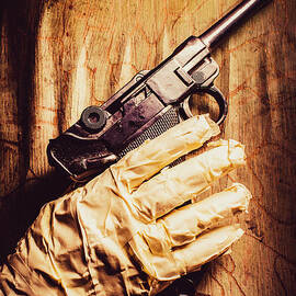 Undead Mummy  Holding Handgun Against Wooden Wall by Jorgo Photography