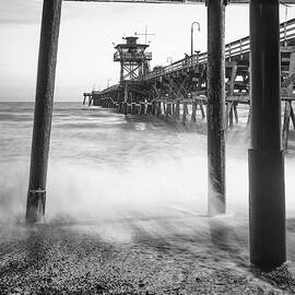 Under San Clemente Pier Black and White Photo by Paul Velgos