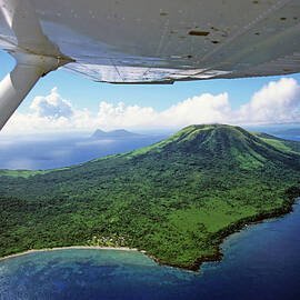 Volcanoes seen from a plane on the island of Efate by Sami Sarkis Photography