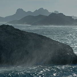 Waves crashing against Riou Island coast on a windy day by Sami Sarkis Photography
