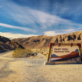 Welcome sign at the entrance to Death Valley National Park by Miroslav Liska