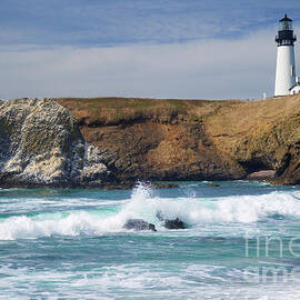 Yaquina head lighthouse on the Oregon coast by Bruce Block