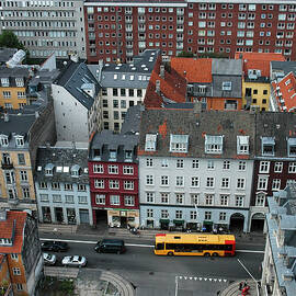 Yellow Bus in Copenhagen Denmark by Mary Lee Dereske