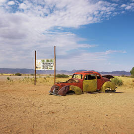 Abandoned car wreck in Solitaire located in the Namib Desert of Namibia by Miroslav Liska